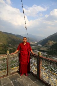 Bhutan - Punakha - Khamsum Yulley Namgyal Chorten - monk