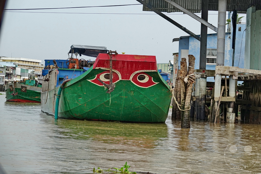 Vietnam - Mekong - Mekong cargo ship painted with eyes against evil spirits