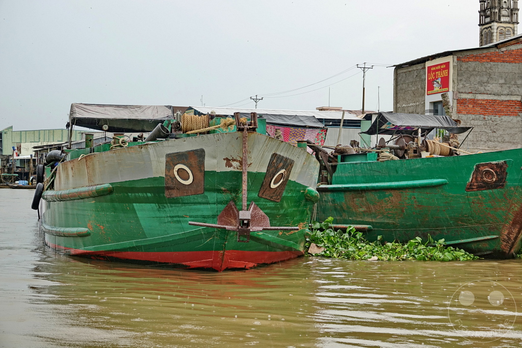 Vietnam - Mekong - Mekong cargo ship painted with eyes against evil spirits