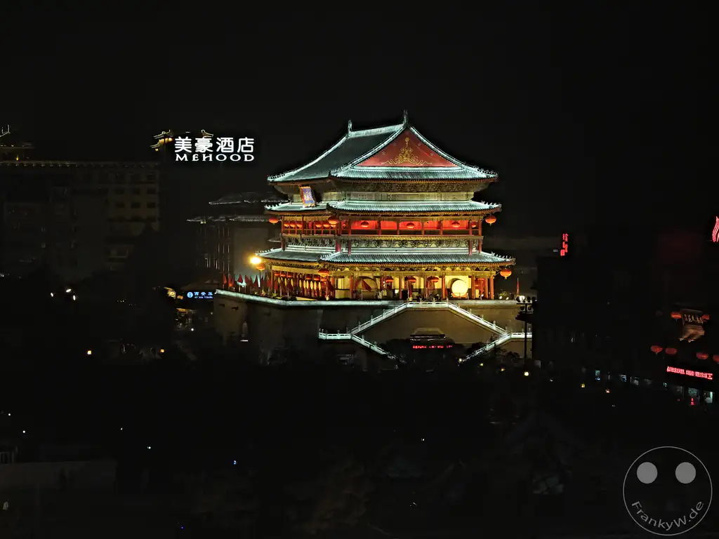 China - Xi'an - night view of the historic Xi'an Bell Tower illuminated against the dark night sky