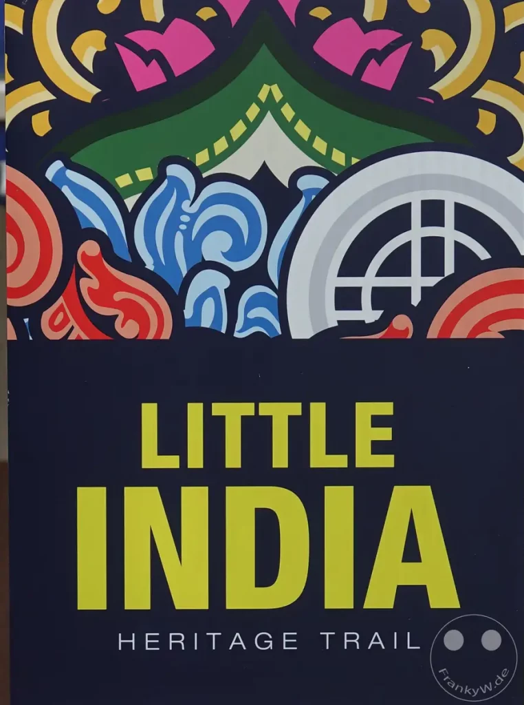 Die Grafik präsentiert den "Little India Heritage Trail" in Singapur mit lebendigen, stilisierten Elementen, die indische Kultur und Festlichkeit widerspiegeln. Farbenfrohe Muster und Symbole erzeugen eine einladende und kulturell reiche Atmosphäre. Das Design lädt dazu ein, die Geschichte und Traditionen von Little India zu entdecken.
